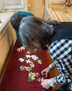Young puzzle artists in the Hermitage Museum